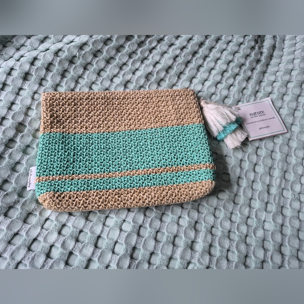 Philosophy Woven Clutch with Tassel